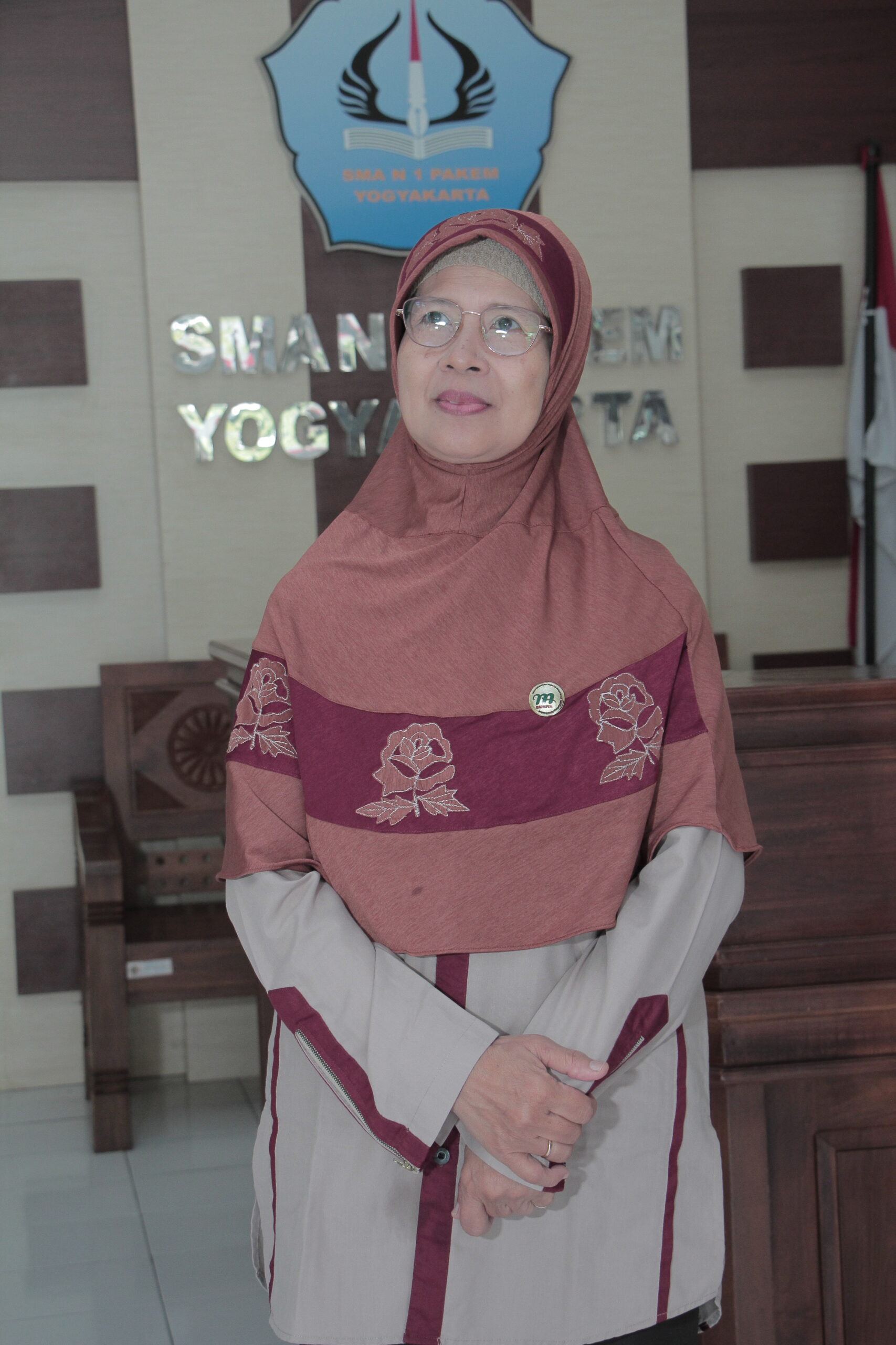 Dra. ALFA NURHASANAH.